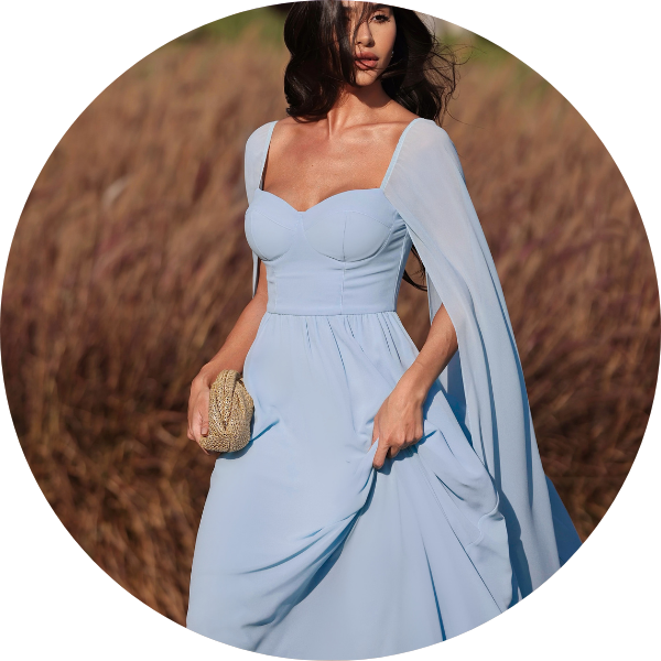 princess polly baby blue dress Beautiful woman in elegant blue dress with plume posing on dark background.  Back view Stock Photo main image 1
